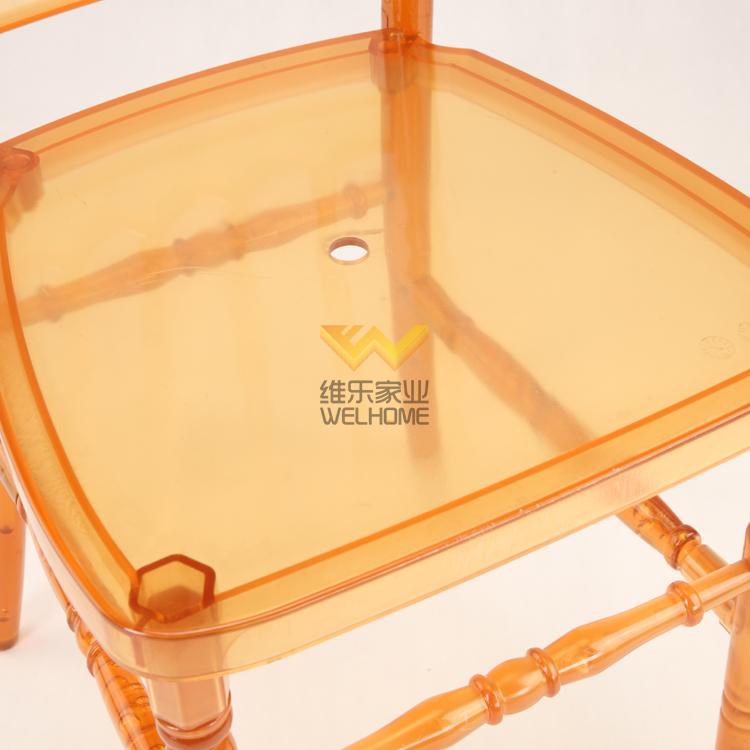 Orange acrylic Napoleon chair for wedding/event