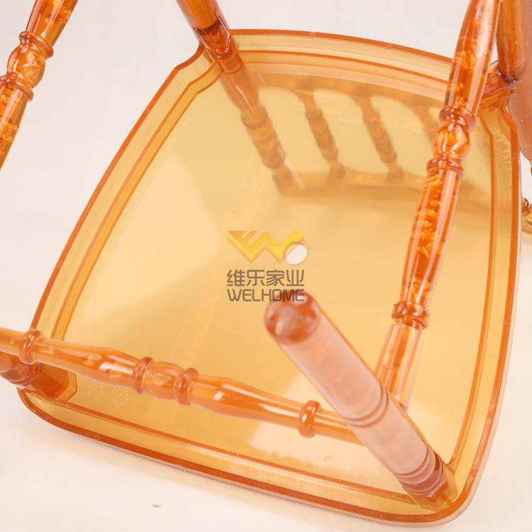 Orange acrylic Napoleon chair for wedding/event