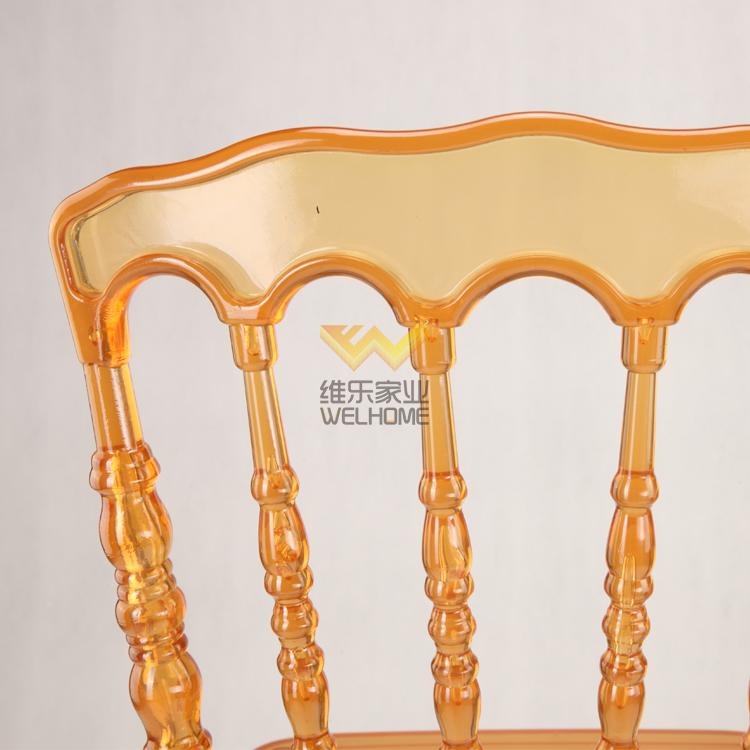 Orange acrylic Napoleon chair for wedding/event